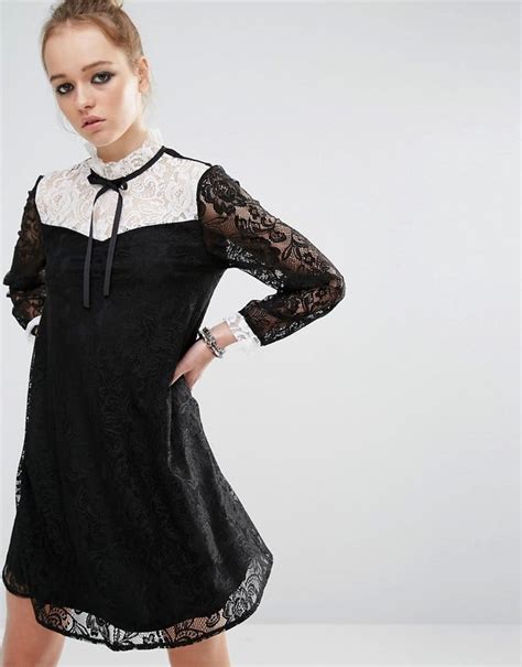 Reclaimed Vintage Mini Dress In Lace With Contrast Bib And Tie Neck