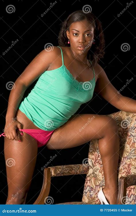 African American Woman In Lingerie By Chair Stock Image Image Of