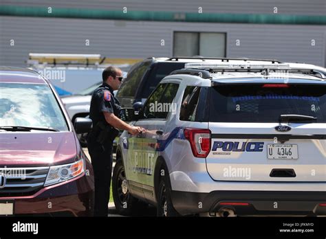 Champaign June 9 9th June 2017 A Police Officer Prepares To Inspect