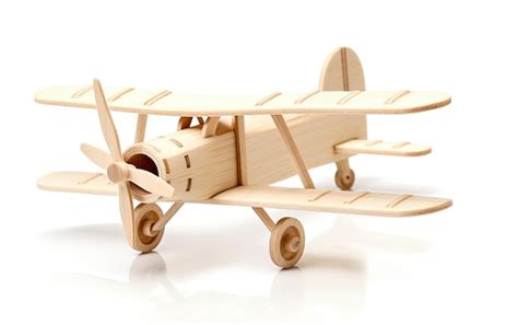 Premium Photo | Wooden Model Airplane on White Background