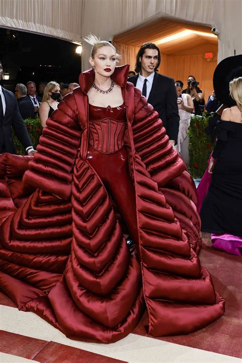 Gigi Hadid Wore A Bold Red Leather Catsuit And Corset To The Met Gala