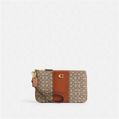 Coach Small Wristlet In Micro Signature Jacquard In Brown Lyst