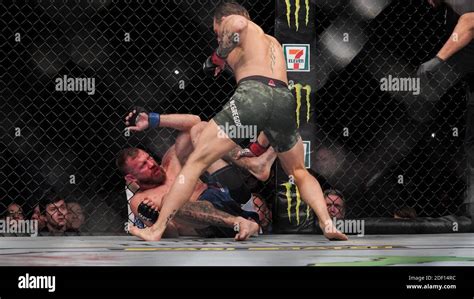 Conor Mcgregor Defeats Donald Cerrone In A Welterweight Bout During