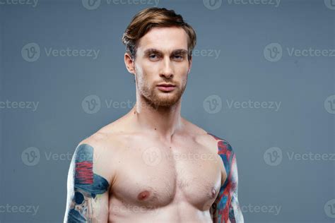 Man With Tattoo Naked Torso Sport Fitness Gray Background Portrait