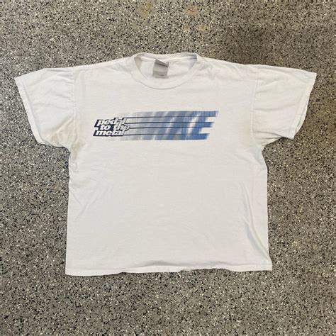 White Nike Graphic Tee Size L - fits M/L Small stain... - Depop