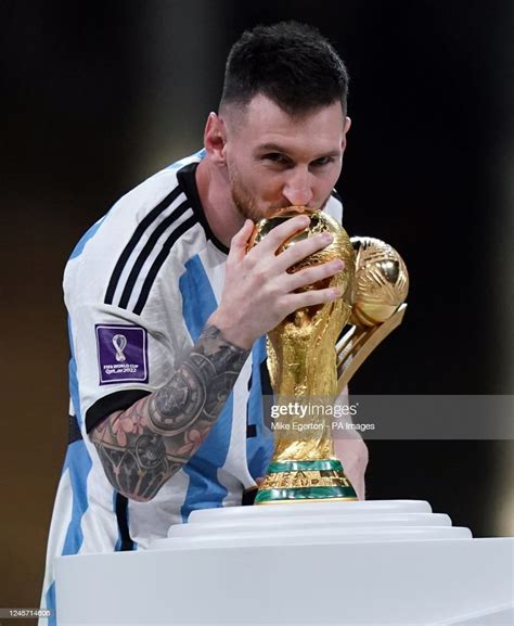 Argentinas Lionel Messi Kisses The Fifa World Cup Trophy After Being News Photo Getty Images