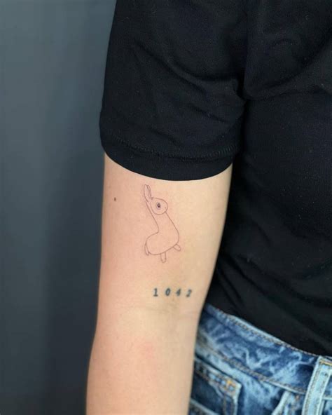 Minimalistic Llama Tattoo Done On The Upper Arm