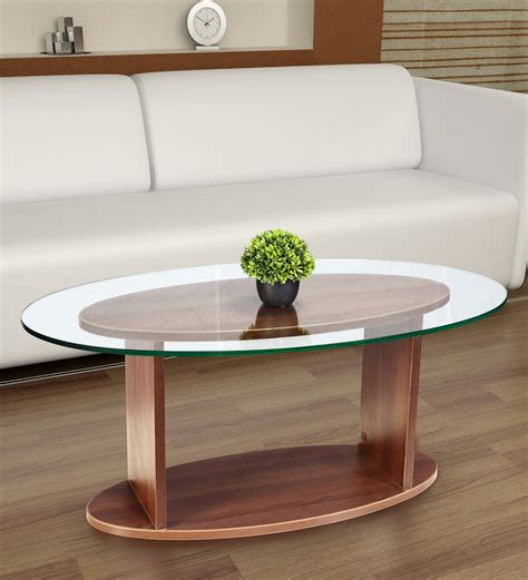 Buy Oval Shaped Glass Top Coffee Table In Walnut Finish By Addy Design Online Oval Coffee