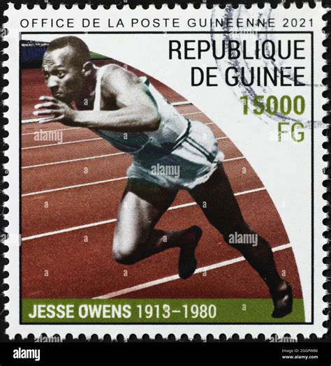 Jesse Owens Sprinting On Postage Stamp Stock Photo Alamy