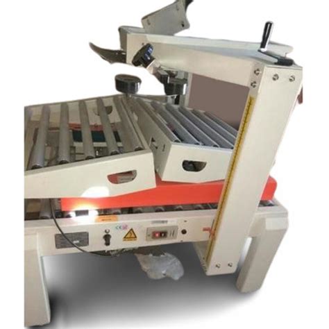 Semi Automatic Carton Taping Machine Inr Avm Packaging Systems