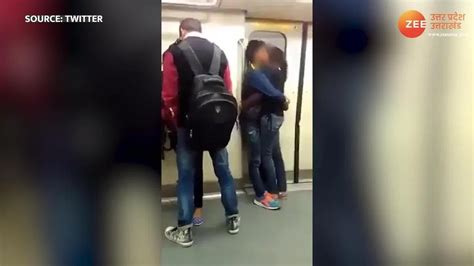 Watch Breaking News Delhi Metro Couple Liplock Kissing Video Goes Viral