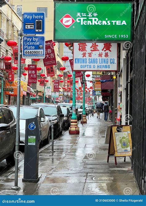 Rain Drenched Street in Chinatown Decked Out with Paper Lanterns for
