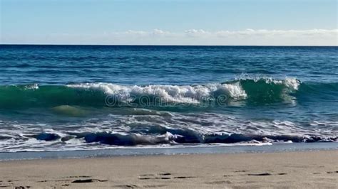 Waves Crashing Bright Sunny Day Large Mansion Homes Along The Beach