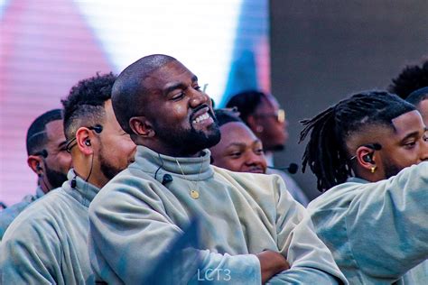 Rare pic of Ye Smiling, but another from ASU event. : r/Kanye