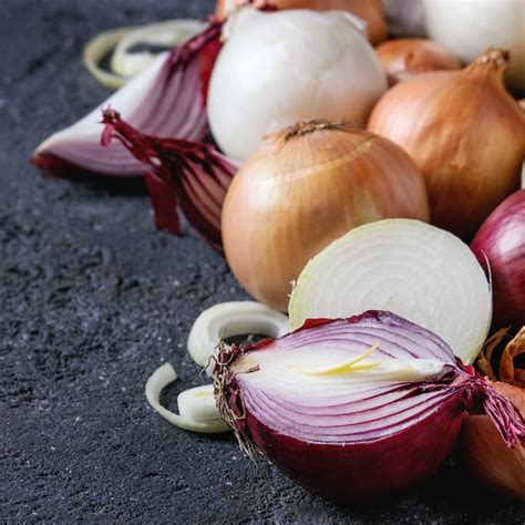 Premium Photo Variety Of Whole And Sliced Onion