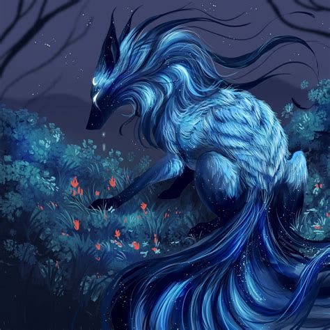 Download A Blue Fox With Long Hair In The Forest Wallpaper | Wallpapers.com