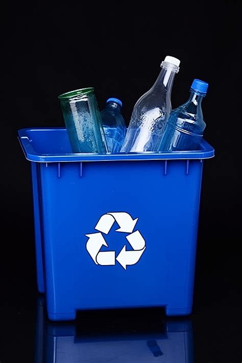 Blue Recycling Bin With One Glass And Bottle Royalty Free Background