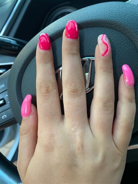 Different Shades Of Pink Nails With Ring Finger Swirl Design Vibrant Guide