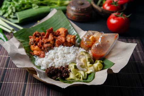 Nasi kukus ayam berempah stock photo. Image of hawker - 142044188