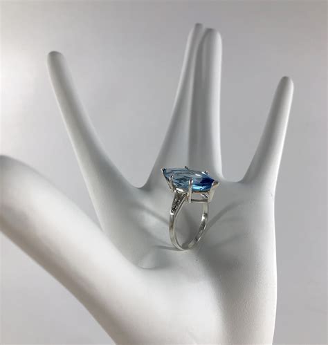 64 Carats Blue Topaz Marquise Cut Round White Sapphire And Sterling