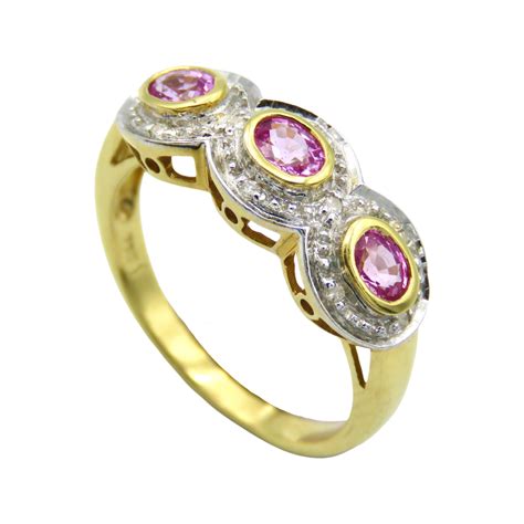 Bague Or Jaune Et Gris 18 Cts Avec Saphirs Roses Et Diamants Taille 54