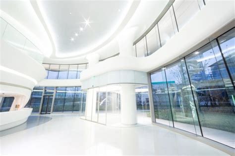 Futuristic modern office building interior Stock Photo by ©zhudifeng ...