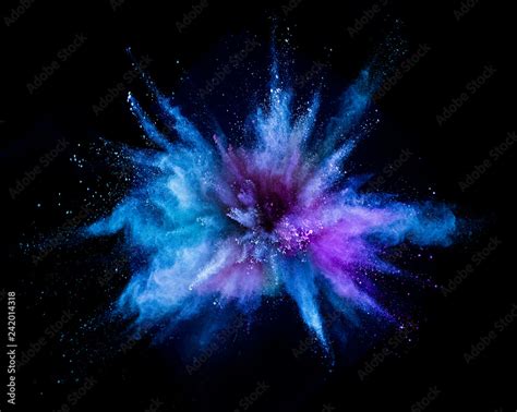 Explosion of colored powder on black background Stock Photo | Adobe Stock