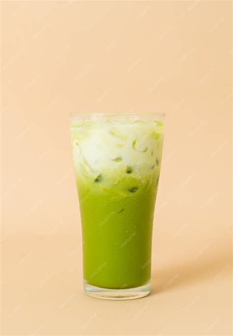 Premium Photo Iced Matcha Green Tea Latte With Milk Layer In Glass