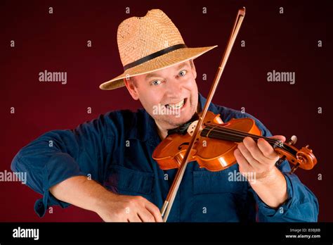 Playing Fiddle Hi Res Stock Photography And Images Alamy