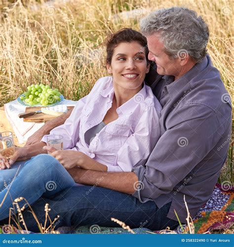 Nothing More Romantic Than A Picnic A Loving Mature Couple Enjoying An Intimate Picnic Together