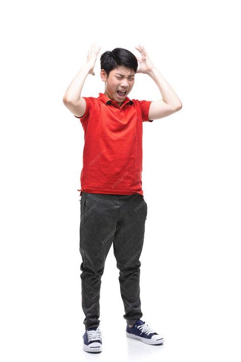 premium photo angry boy isolated  white