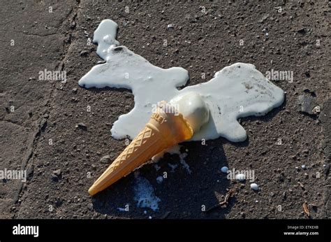 Melting Ice Cream Cone On The Pavement Stock Photo Alamy