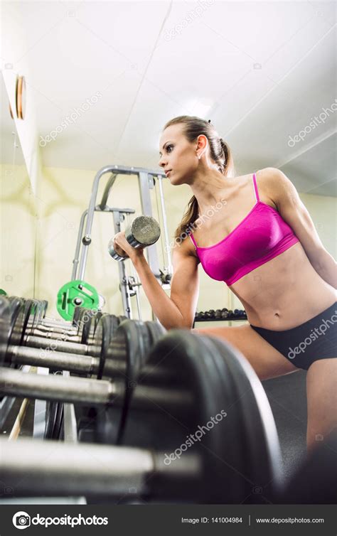 Girl training in gym Stock Photo by ©borjomi88 141004984