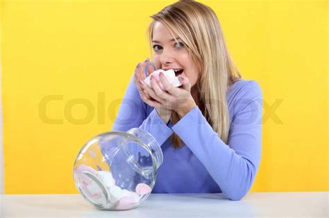 girl eating candy colourbox