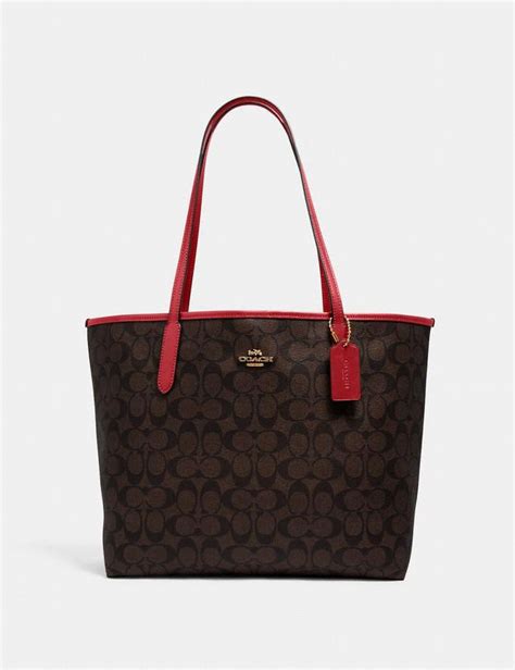 coach womens signature canvas city tote leather details zip pocket