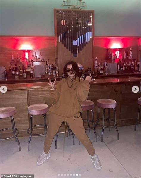 Charli XCX Shows Off Her Figure In A Plunging Purple Bikini Daily Mail Online