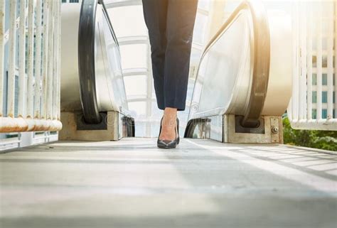 Walking With Purpose A Young Businesswoman Legs Walking To Work In The
