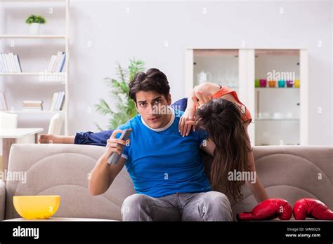 Wife Unhappy That Husband Is Watching Boxing Stock Photo Alamy