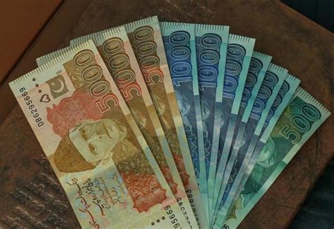 Pakistan Currency Stock Photos, Images and Backgrounds for Free Download