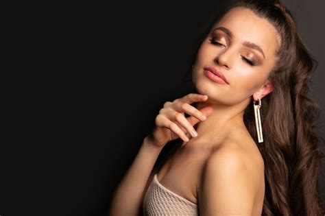 Premium Photo Fashion Studio Portrait Of A Romantic Brunette Woman With Professional Makeup