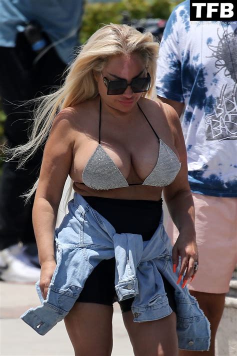 Darcey And Stacey Silva Show Off Their Curves In Tiny Bikini Tops As