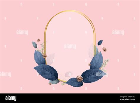 Gold Oval Frame Decorated With Blue Leaves On A Pink Background Stock