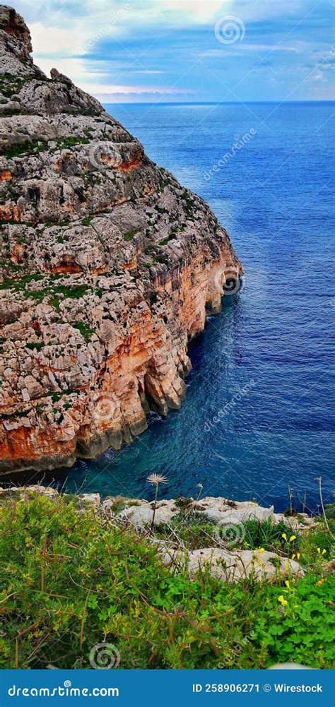 Vertical Shot Of Rocky Cliffs Along Malta Coast Stock Image Image Of