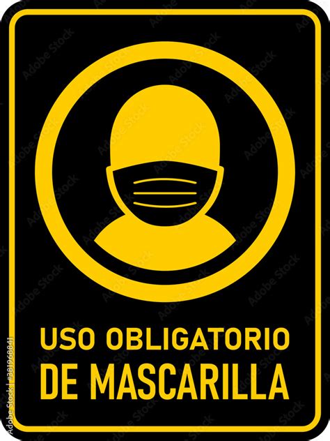 Uso Obligatorio De Mascarilla Face Masks Required In Spanish Vertical Sign Against The