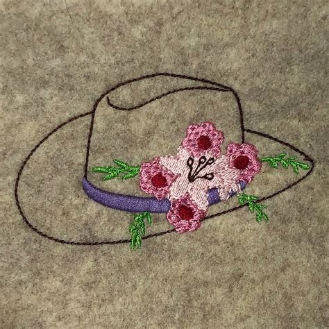 Cowgirl hat with flowers embroidery design - Machine Embroidery Geek