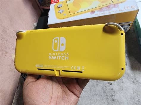 Nintendo Switch Lite CFW Atmos Yellow Fullset 128GB 01 Video Game