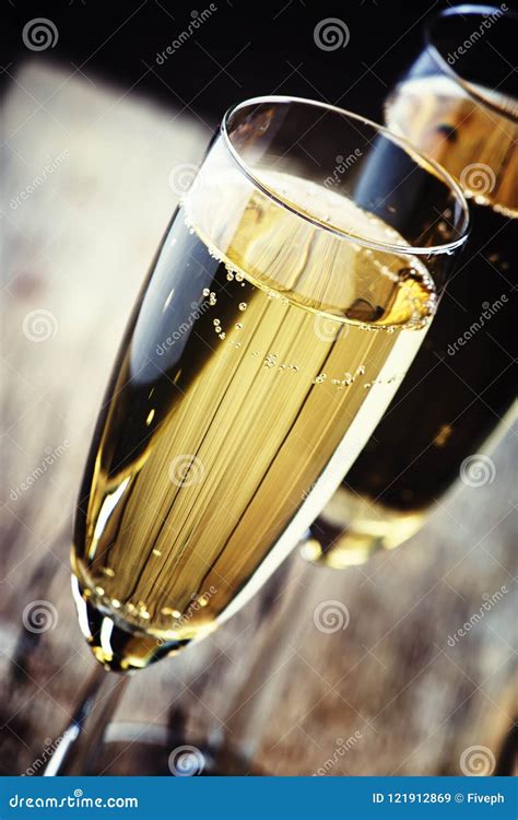 Glasses Of Champagne On The Old Wooden Table Rustic Style Sele Stock Image Image Of Dark