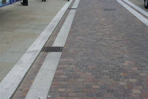 Widemarsh Street Sidewalk Porphyry Setts Silver Grey Granite Paving