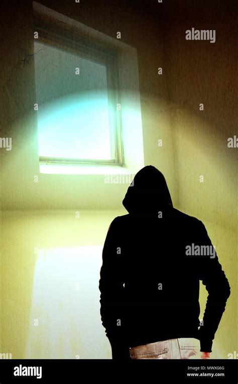 Hooded figure silhouette hi-res stock photography and images - Alamy