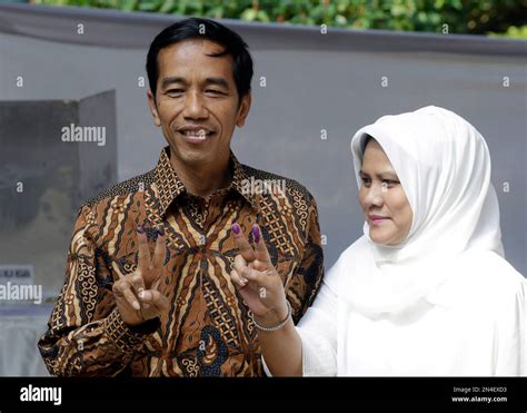 Indonesian Presidential Candidate Joko Widodo Popularly Known As Jokowi Left And His Wife